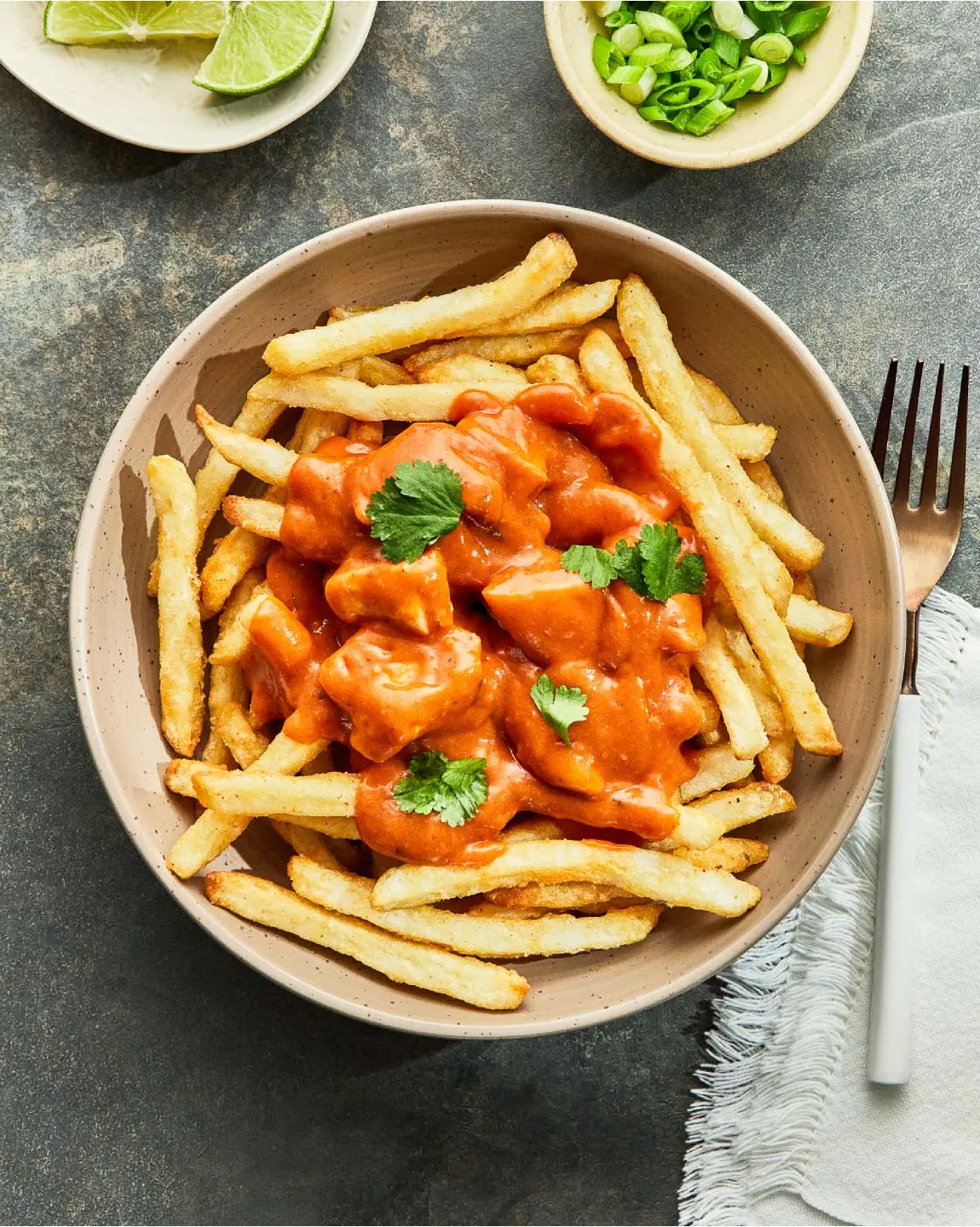 Butter Chicken Poutine at Curry in Hurry in Sherwood Park - fusion dish with fries, cheese curds and butter chicken sauce